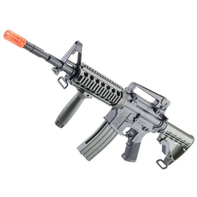 Colt Licensed Tactical Spring Powered M4 Airsoft Rifle in Ranger Green by Cybergun with quad rail and flip-up sights