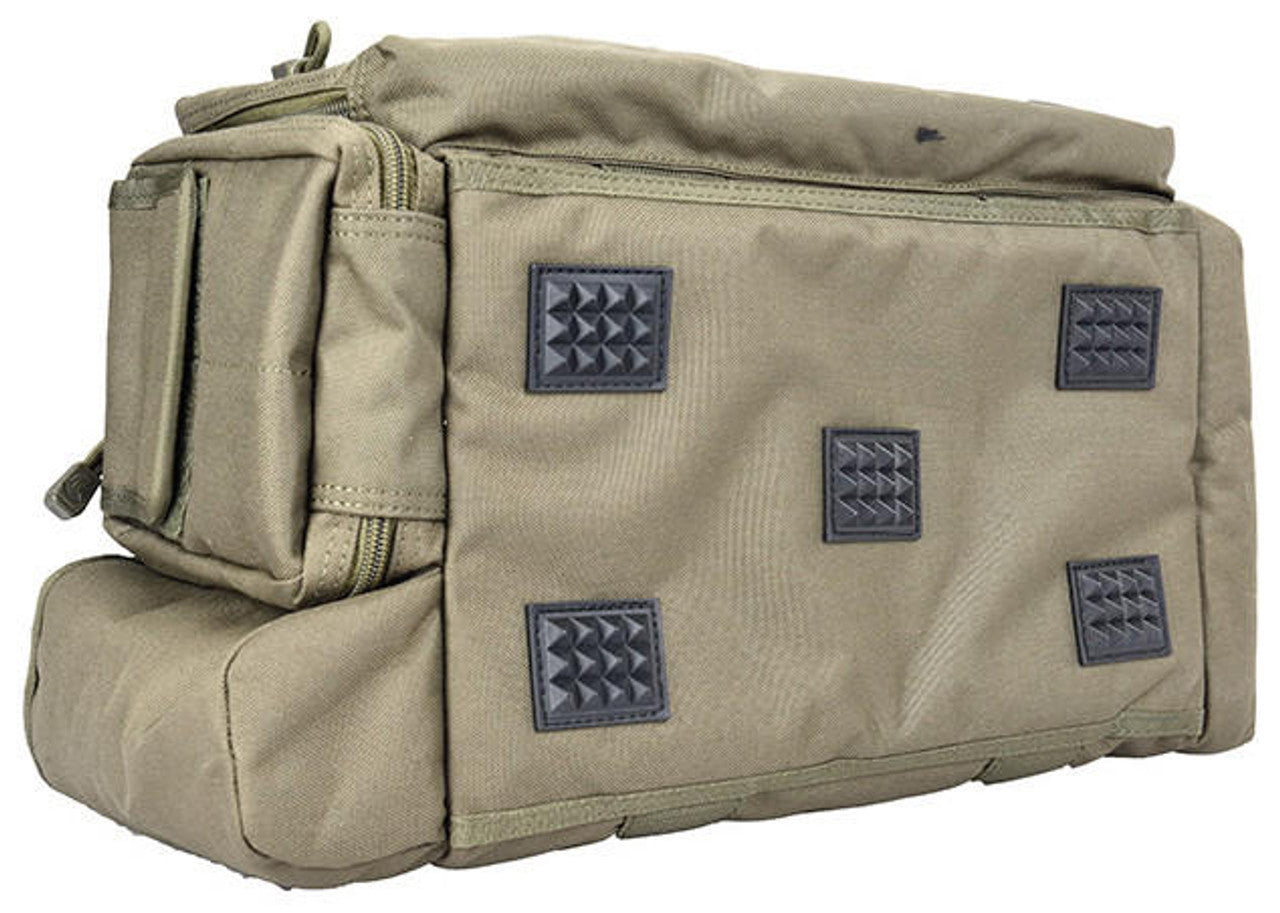 Inside view of the bag, featuring padded dividers for organizing handguns, ammo, and protective gear - Bottom Side view rubber feet