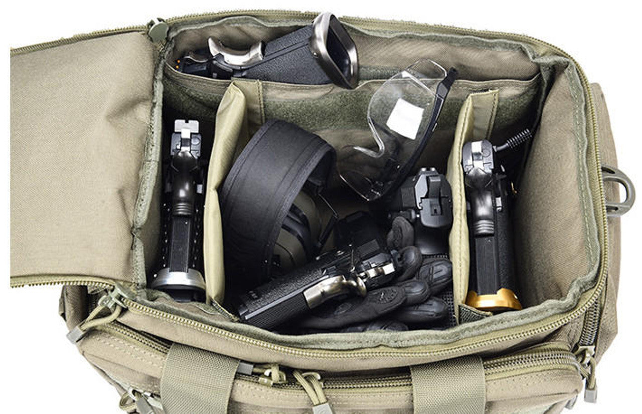 Inside view of the bag, featuring padded dividers for organizing handguns, ammo, and protective gear