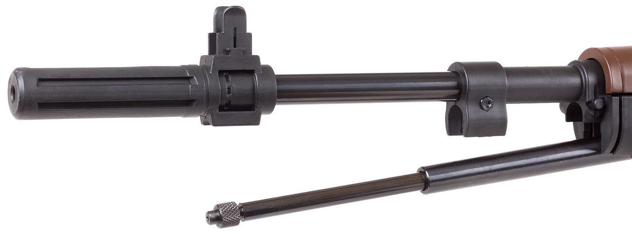 M1A replica pellet rifle with underlever cocking mechanism and authentic design being cocked