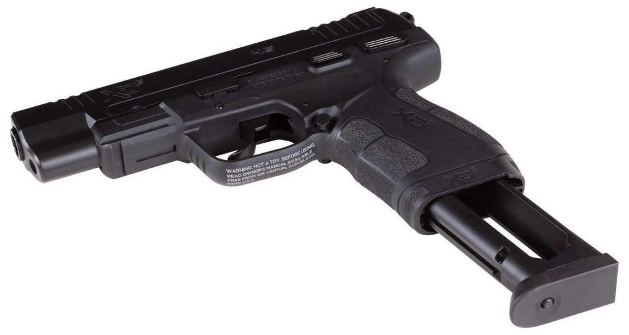 Springfield XDE air pistol with 18-round drop-free magazine removed for reloading