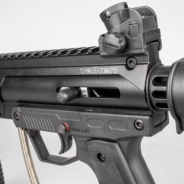 Valken SW‑1 Blackhawk Tango Rig .68 Cal Tactical Paintball Marker with 12-inch ported barrel, vertical foregrip, collapsible stock, and stainless air line for HPA or CO₂ use