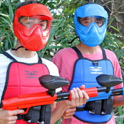 Valken Gotcha Reversible Youth Paintball Chest Protector worn by young paintball players in red and blue protective vests.