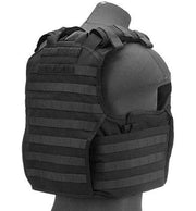Full view of Code 11 Medium Exo Plate Carrier in Black with ballistic plates inserted, demonstrating the secure and protective fit for tactical operations