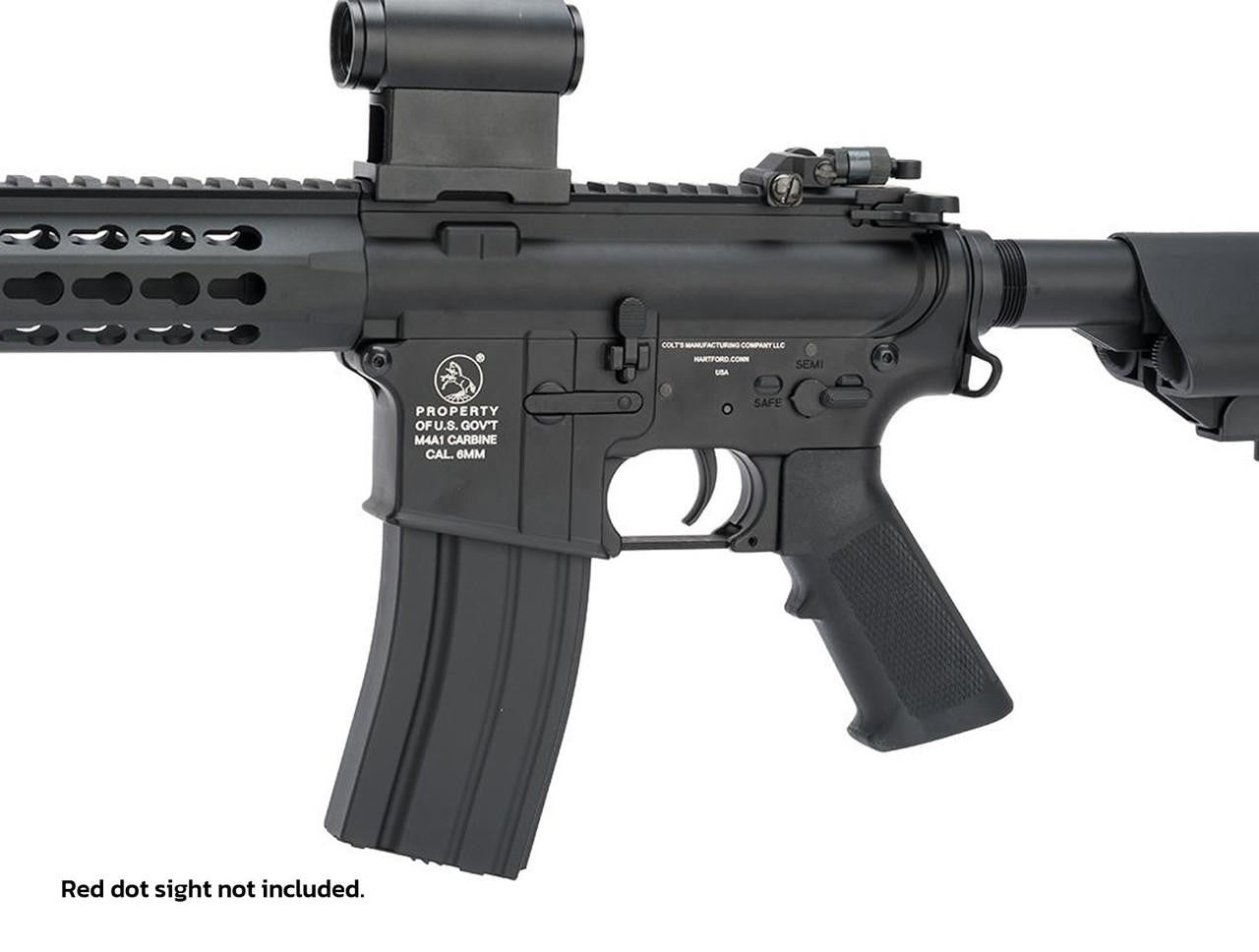 Colt M4A1 Full Metal Keymod AEG - view of the magazine, trigger, pistol grip, firing mode switch, and optional laser sight