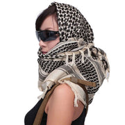 Valken Shemag Face Wrap worn as a tactical head and face covering in black and tan pattern.