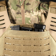 Close-up of the Valken Laser Cut Plate Carrier front panel with rifle magazine pouch attached.