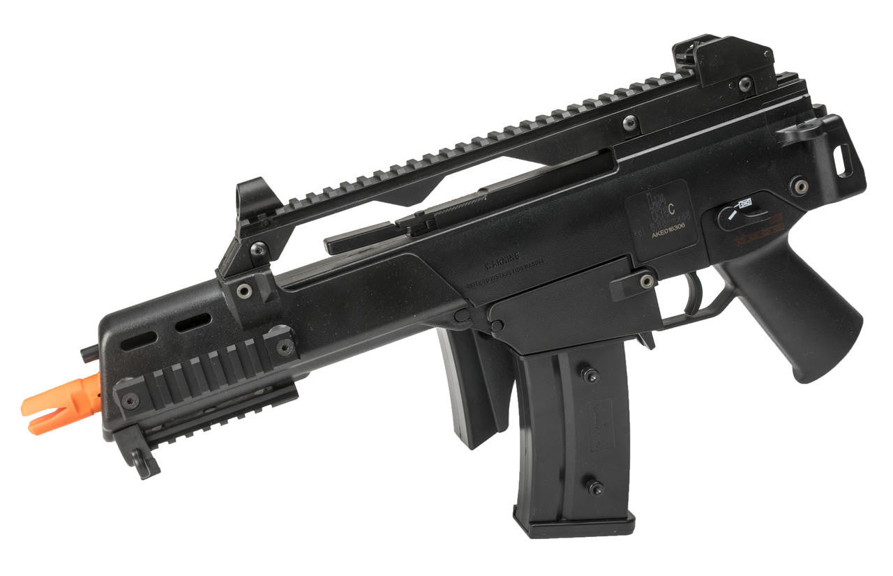Foldable stock and full Picatinny rail on H&K G36C airsoft gun